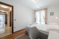 Postel nebo postele na pokoji v ubytování Apartment Maro Bayview