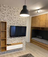 Televízia a/alebo spoločenská miestnosť v ubytovaní Penzión Vila Petra Bed&Breakfast