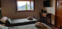 Posteľ alebo postele v izbe v ubytovaní Casa Vista della Roccia