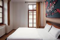 Łóżko lub łóżka w pokoju w obiekcie Hotel Javor