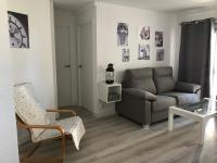 A seating area at APARTAMENTO SOL Y PLAYA