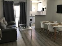 A seating area at APARTAMENTO SOL Y PLAYA