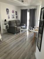 A seating area at APARTAMENTO SOL Y PLAYA