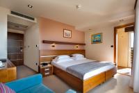 Posteľ alebo postele v izbe v ubytovaní Hotel Plaža