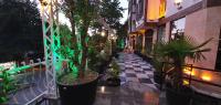 A garden outside Mersu A'la Konak Otel