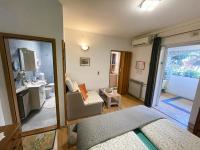 Łóżko lub łóżka w pokoju w obiekcie Villa Palma Rovinj