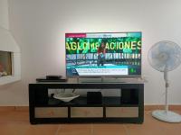 TV a/nebo společenská místnost v ubytování Villa Agave