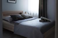 Posteľ alebo postele v izbe v ubytovaní Apartamenty France Faktura VAT