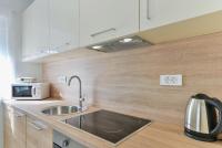 Kuchyňa alebo kuchynka v ubytovaní Resort Mirakul