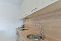 Kuchyňa alebo kuchynka v ubytovaní Resort Mirakul