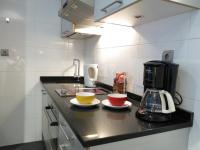 Kuchnia lub aneks kuchenny w obiekcie Principe Santa Ana Madrid Centro