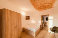 Postel nebo postele na pokoji v ubytování Hotel Dymník
