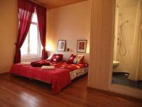 Postel nebo postele na pokoji v ubytování Hôtel Garni Villa Carmen