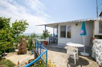 Balkón nebo terasa v ubytování Ваканционни къщи'На брега' Holiday houses ON THE COAST