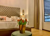 Postel nebo postele na pokoji v ubytování INTOMILAN Galleria Duomo I Boutique & Design Aparthotel