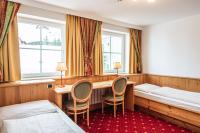 Postel nebo postele na pokoji v ubytování Hotel Scherlin