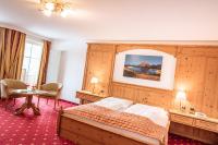 Postel nebo postele na pokoji v ubytování Hotel Scherlin