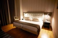 A bed or beds in a room at Hotel Concord