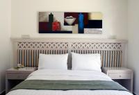 Postel nebo postele na pokoji v ubytování Amazon Hotel
