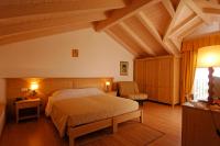 Posteľ alebo postele v izbe v ubytovaní Agriturismo Maso Grener