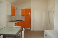 A kitchen or kitchenette at Villaggio Solveig Family Apartments