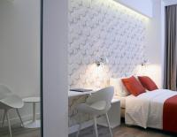 Postel nebo postele na pokoji v ubytování Amazon Hotel