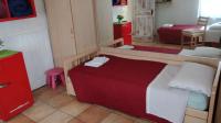 A bed or beds in a room at La Luna nel Parco