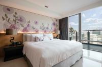 Postel nebo postele na pokoji v ubytování Sivatel Bangkok Hotel