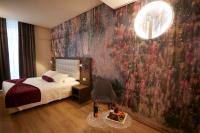 A bed or beds in a room at Hotel Concord