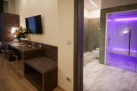 A television and/or entertainment centre at Hotel Concord