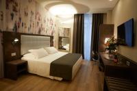 A bed or beds in a room at Hotel Concord