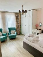 Postel nebo postele na pokoji v ubytování Guest House Holiday in Melnik