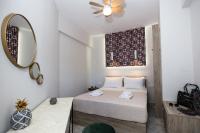 Postel nebo postele na pokoji v ubytování NK Apartments