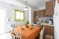Kuchyň nebo kuchyňský kout v ubytování Tsakanos Apartments