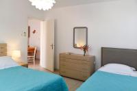 Postel nebo postele na pokoji v ubytování Tsakanos Apartments
