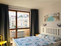 A bed or beds in a room at APARTELLO Modern Apartment - Balkan Breeze 7