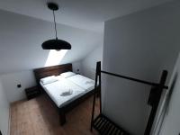Postel nebo postele na pokoji v ubytování Nad Hřištěm 441