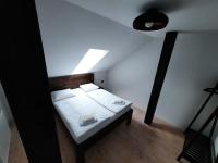 Postel nebo postele na pokoji v ubytování Nad Hřištěm 441