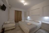 Posteľ alebo postele v izbe v ubytovaní Aphrodite Hotel & Apartments