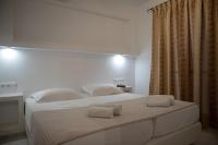 Posteľ alebo postele v izbe v ubytovaní Aphrodite Hotel & Apartments