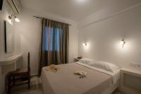 Posteľ alebo postele v izbe v ubytovaní Aphrodite Hotel & Apartments