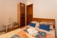 Posteľ alebo postele v izbe v ubytovaní Villa, Stone House with swimming pool & Sauna, Beach, Sevid