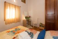 Posteľ alebo postele v izbe v ubytovaní Villa, Stone House with swimming pool & Sauna, Beach, Sevid