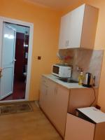 A kitchen or kitchenette at Gelov Hotel