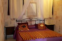 Posteľ alebo postele v izbe v ubytovaní Relais Villa Lucia