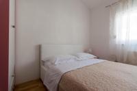 Posteľ alebo postele v izbe v ubytovaní Apartments City View