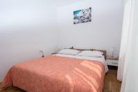 Posteľ alebo postele v izbe v ubytovaní Apartments City View