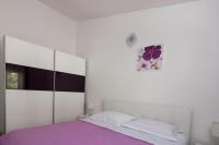 Posteľ alebo postele v izbe v ubytovaní Apartments City View