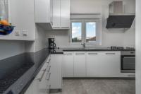 Kuchyňa alebo kuchynka v ubytovaní Apartments City View