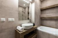 Kúpeľňa v ubytovaní TatryTop Apartamenty Alpejski SPA